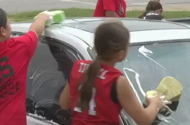 Young Softball Team Fundraises for Championship Tournament