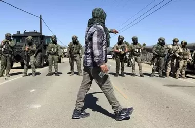 Federal Agents and Protesters Clash During Farm Raid in Southern California