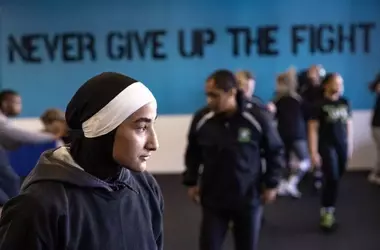 Sisters Revolutionize Women's Wrestling with Faith-Based Uniforms