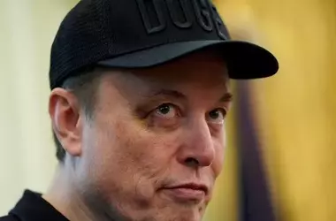 Tesla Faces Headwinds as Musk Warns of Challenging Quarters Ahead