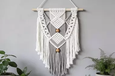 Macramé: The Structural Mechanics of Fiber Interlooping